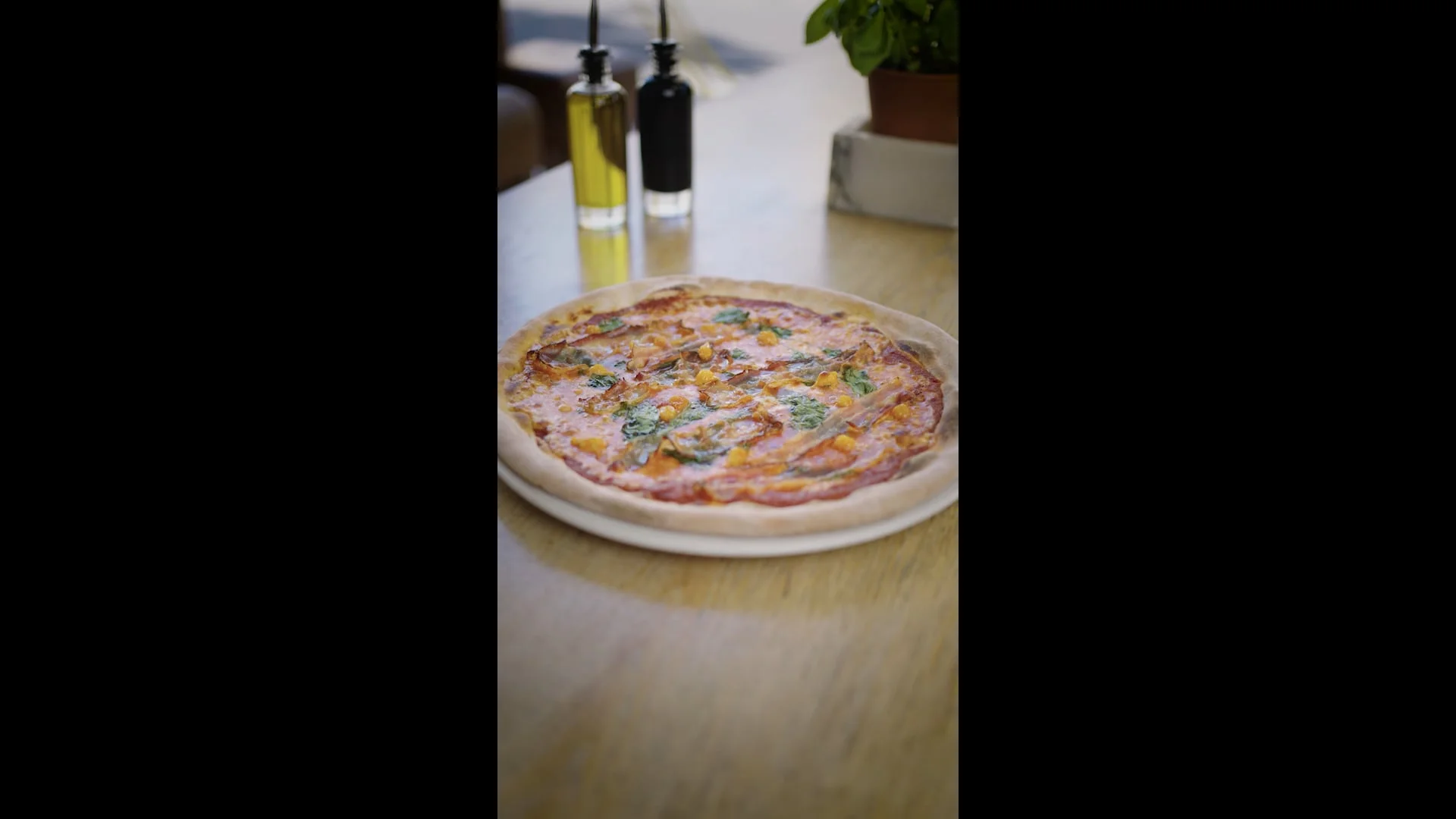 Vapiano Pancetta Pizza - Vertical format video showcasing signature Italian pizza
